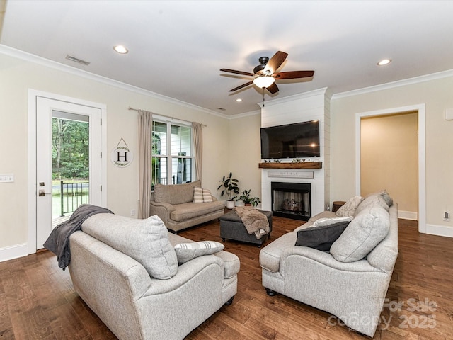 618 Deese Rd, Monroe, NC 28110 - living room with ceiling fan, ornamental molding, a fireplace, dark wood-type flooring, and recessed lighting