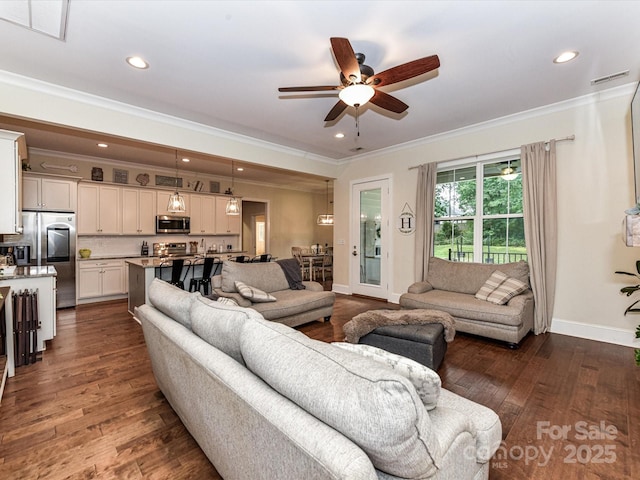 618 Deese Rd, Monroe, NC 28110 - living area featuring crown molding, a ceiling fan, dark wood-style floors, and recessed lighting