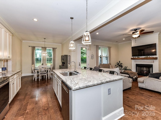 618 Deese Rd, Monroe, NC 28110 - kitchen featuring crown molding, dark wood finished floors, plenty of natural light, white cabinets, and light stone countertops