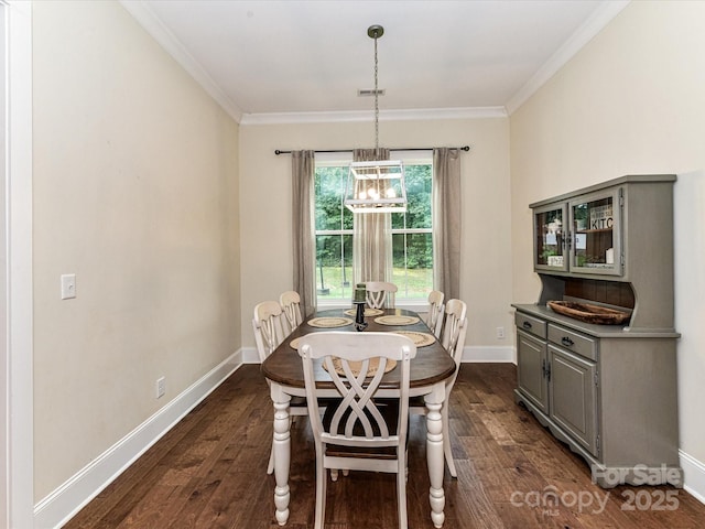 618 Deese Rd, Monroe, NC 28110 - dining room with a chandelier, dark wood-style floors, and crown molding