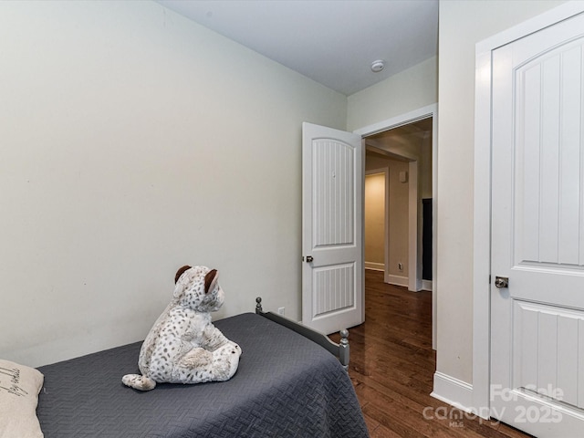 618 Deese Rd, Monroe, NC 28110 - bedroom with wood finished floors and baseboards