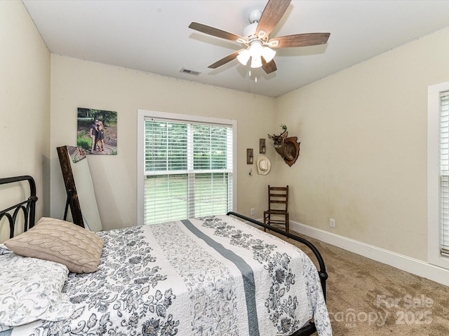 618 Deese Rd, Monroe, NC 28110 - carpeted bedroom with baseboards and ceiling fan
