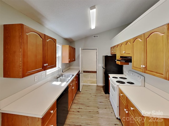 1108 Brookwood Dr, Stanley, NC 28164 - kitchen with white range with electric cooktop, dishwasher, light wood-style floors, lofted ceiling, and under cabinet range hood