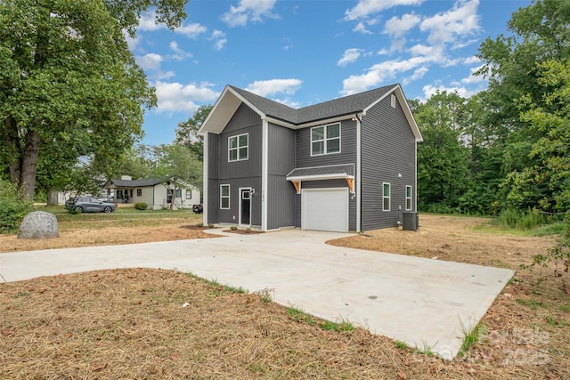 782 Stanley Spencer Mtn Rd, Gastonia, NC 28056 - view of front of home with driveway, a garage, and roof with shingles