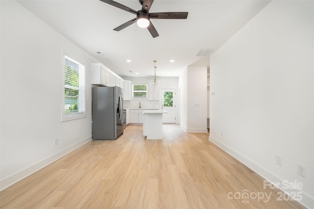 782 Stanley Spencer Mtn Rd, Gastonia, NC 28056 - unfurnished living room featuring light wood-type flooring, a ceiling fan, and recessed lighting