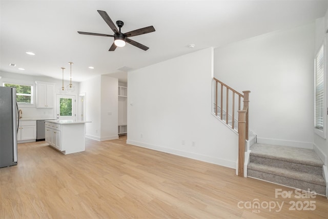 782 Stanley Spencer Mtn Rd, Gastonia, NC 28056 - unfurnished living room featuring stairs, light wood-style floors, recessed lighting, and ceiling fan