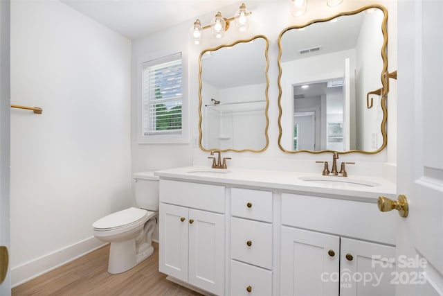 782 Stanley Spencer Mtn Rd, Gastonia, NC 28056 - full bathroom featuring wood finished floors, double vanity, and a shower