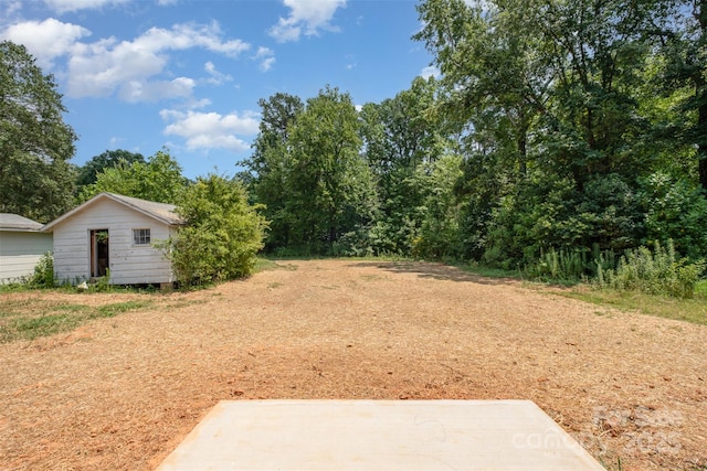 782 Stanley Spencer Mtn Rd, Gastonia, NC 28056 - view of yard with a patio area and an outbuilding