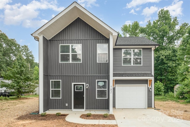 782 Stanley Spencer Mtn Rd, Gastonia, NC 28056 - view of front of home with a shingled roof, a garage, and concrete driveway