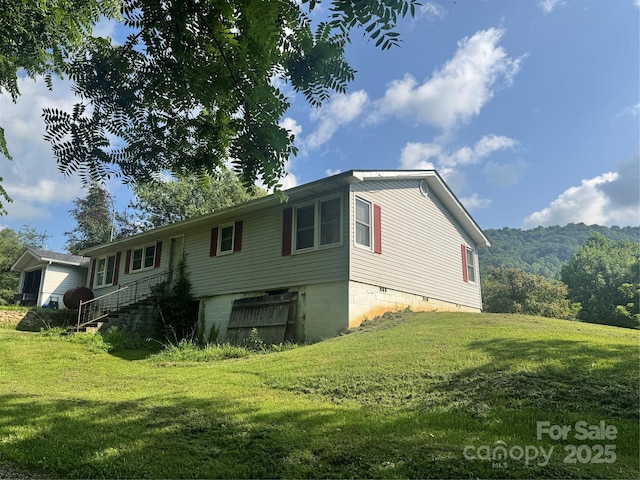 140 Wallins Way, Mars Hill, NC 28754 - rear view of property featuring a yard