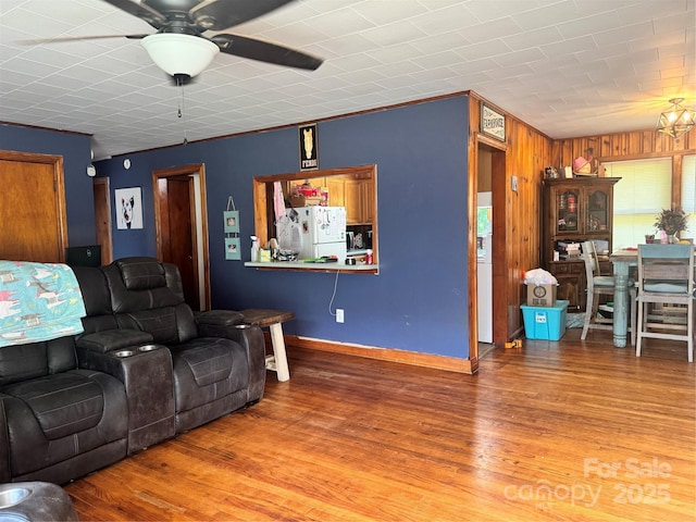 140 Wallins Way, Mars Hill, NC 28754 - living area featuring wood finished floors, ceiling fan, and wood walls