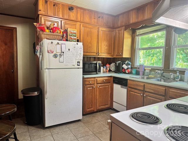 140 Wallins Way, Mars Hill, NC 28754 - kitchen with white appliances, brown cabinetry, light tile patterned floors, and light countertops