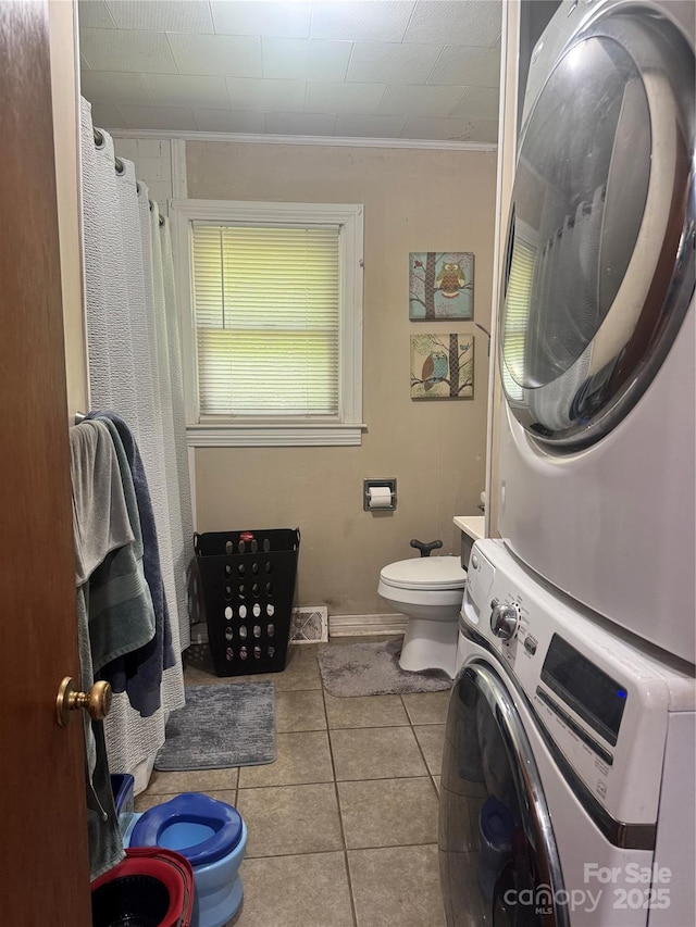140 Wallins Way, Mars Hill, NC 28754 - full bathroom featuring estacked washer and dryer, tile patterned flooring, and ornamental molding