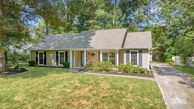 7017 Brookgreen Ter, Matthews, NC 28104 - view of front facade with concrete driveway and roof with shingles