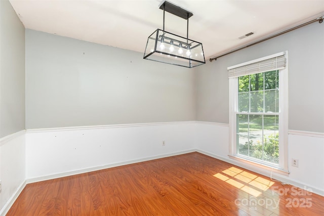 7017 Brookgreen Ter, Matthews, NC 28104 - spare room with wood finished floors