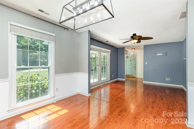 7017 Brookgreen Ter, Matthews, NC 28104 - unfurnished room featuring a ceiling fan and wood finished floors