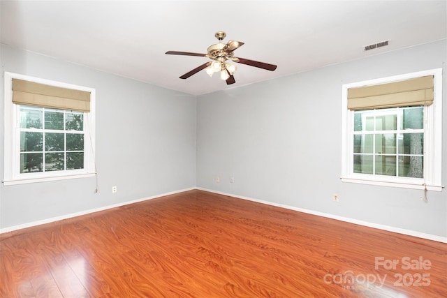 7017 Brookgreen Ter, Matthews, NC 28104 - empty room featuring a ceiling fan and wood finished floors