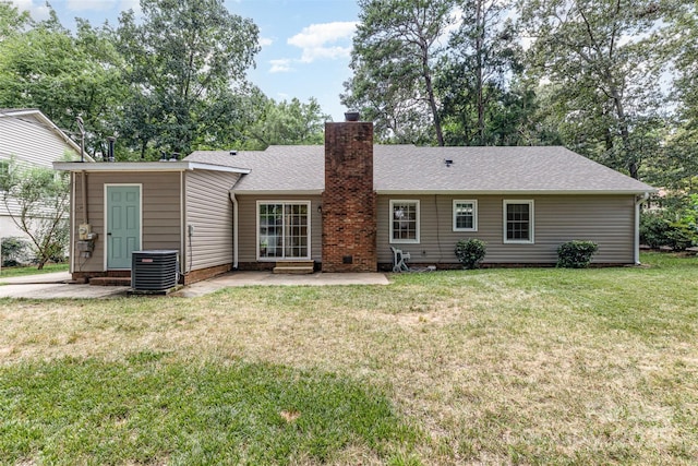 7017 Brookgreen Ter, Matthews, NC 28104 - back of house with a chimney, a patio, entry steps, and a yard