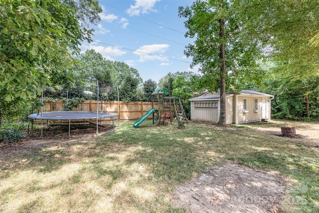 7017 Brookgreen Ter, Matthews, NC 28104 - fenced yard featuring a trampoline, a playground, a fire pit, and a shed