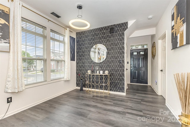 8424 Spirea Ct, Charlotte, NC 28215 - foyer with an accent wall and wood finished floors