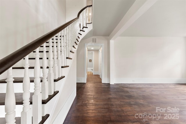 522 Alexander St, Statesville, NC 28677 - stairs featuring wood finished floors and baseboards