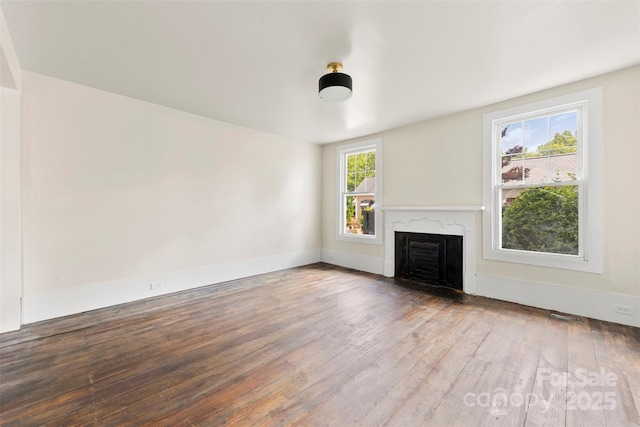 522 Alexander St, Statesville, NC 28677 - unfurnished living room featuring a premium fireplace and hardwood / wood-style flooring