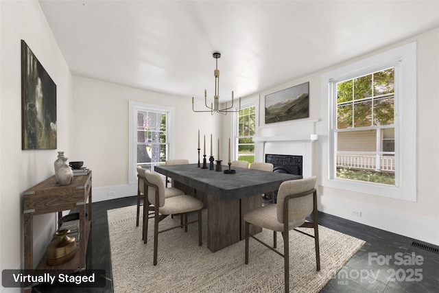 522 Alexander St, Statesville, NC 28677 - dining area featuring plenty of natural light and a fireplace