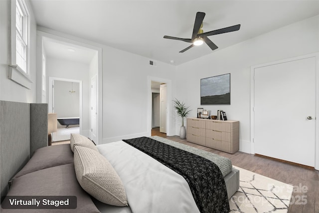 522 Alexander St, Statesville, NC 28677 - bedroom featuring wood finished floors and ceiling fan