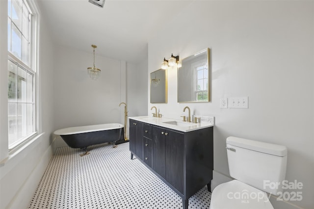 522 Alexander St, Statesville, NC 28677 - bathroom with a freestanding tub and double vanity