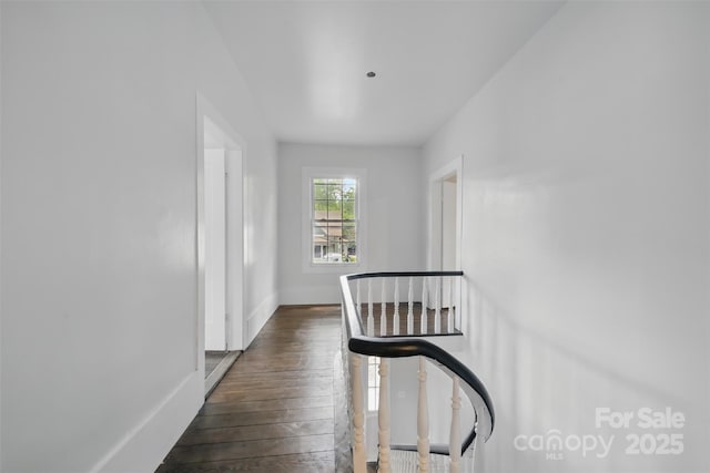 522 Alexander St, Statesville, NC 28677 - hallway featuring dark wood-style flooring and baseboards