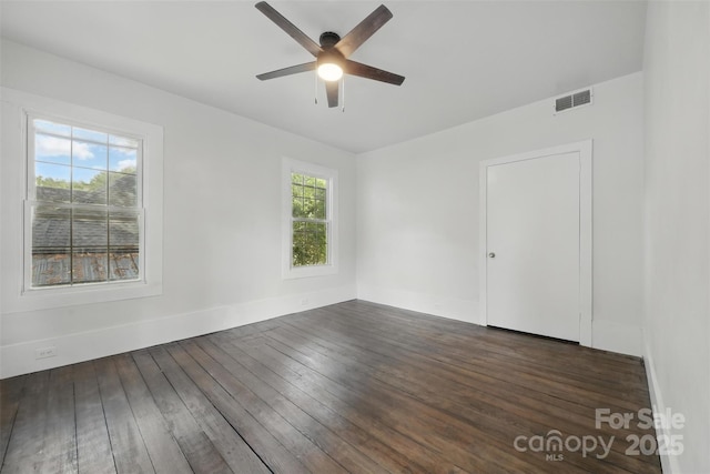 522 Alexander St, Statesville, NC 28677 - spare room with a ceiling fan and dark wood-style flooring