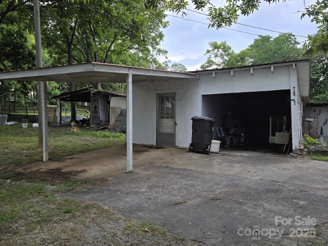 7601 Rhodhiss Rd, Connelly Springs, NC 28612 - view of front of home with an outbuilding and driveway