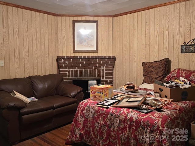 7601 Rhodhiss Rd, Connelly Springs, NC 28612 - living area featuring wood walls, a brick fireplace, and wood finished floors