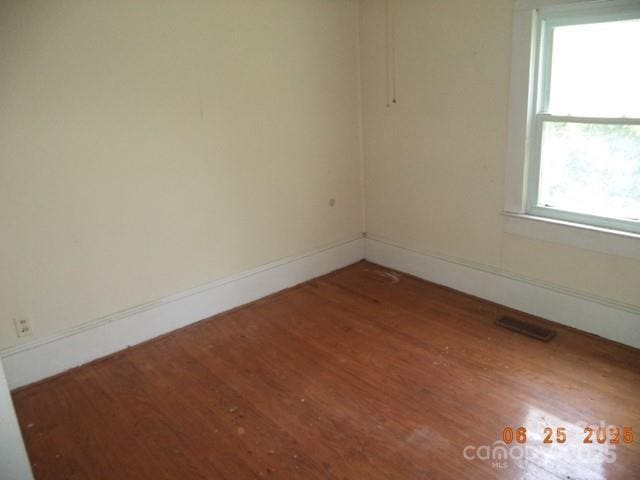 1374 Circle Dr, China Grove, NC 28023 - spare room featuring wood finished floors and baseboards