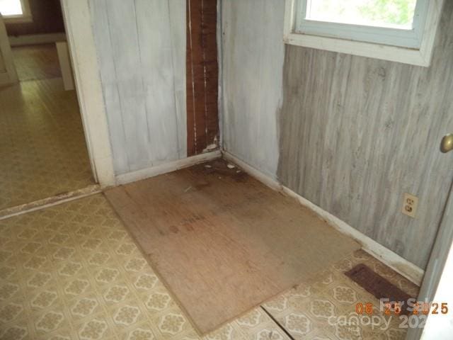 1374 Circle Dr, China Grove, NC 28023 - detailed view of baseboards and wood walls