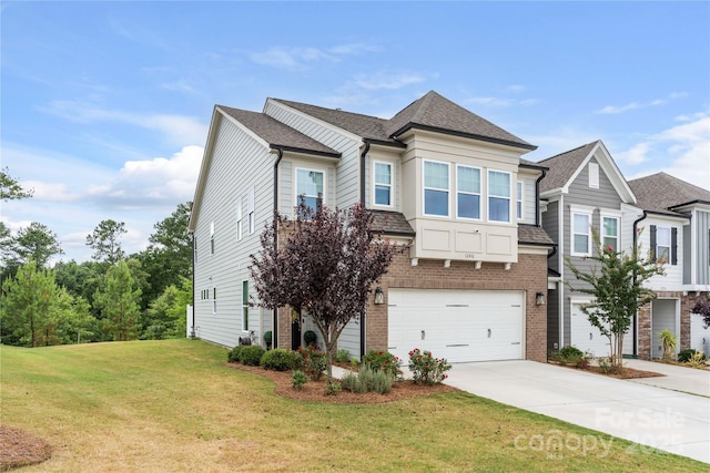 1240 Pebble Grove Dr, Clover, SC 29710 - view of front of home with concrete driveway, a garage, a front lawn, and roof with shingles