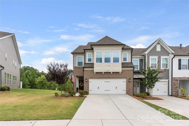 1240 Pebble Grove Dr, Clover, SC 29710 - view of front facade featuring brick siding, driveway, and roof with shingles