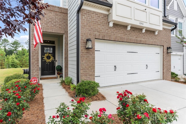 1240 Pebble Grove Dr, Clover, SC 29710 - property entrance featuring brick siding, driveway, and an attached garage