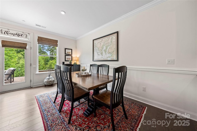 1240 Pebble Grove Dr, Clover, SC 29710 - dining room featuring ornamental molding and wood finished floors