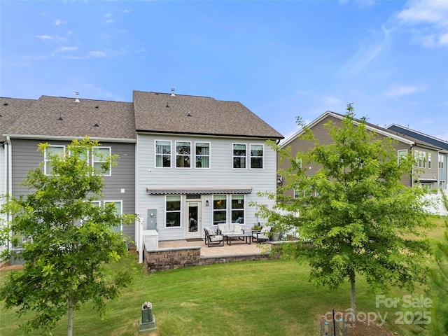 1240 Pebble Grove Dr, Clover, SC 29710 - rear view of property with a patio area, a yard, and roof with shingles