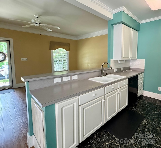 75 Mccurdy St NW, Concord, NC 28027 - kitchen featuring black dishwasher, a peninsula, plenty of natural light, ceiling fan, and ornamental molding