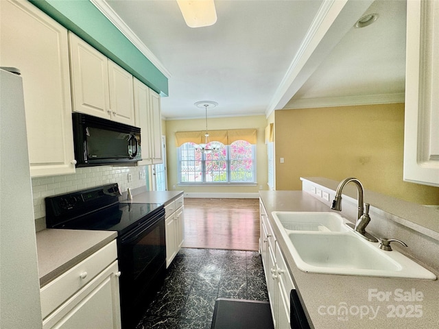 75 Mccurdy St NW, Concord, NC 28027 - kitchen featuring black appliances, crown molding, white cabinetry, decorative backsplash, and decorative light fixtures