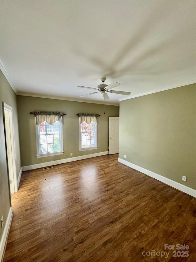 75 Mccurdy St NW, Concord, NC 28027 - empty room featuring wood finished floors, ornamental molding, and a ceiling fan