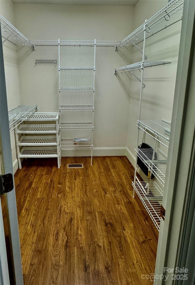 75 Mccurdy St NW, Concord, NC 28027 - spacious closet featuring wood finished floors
