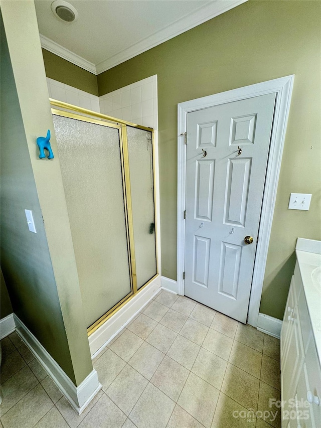 75 Mccurdy St NW, Concord, NC 28027 - full bathroom featuring ornamental molding, a stall shower, vanity, and tile patterned floors