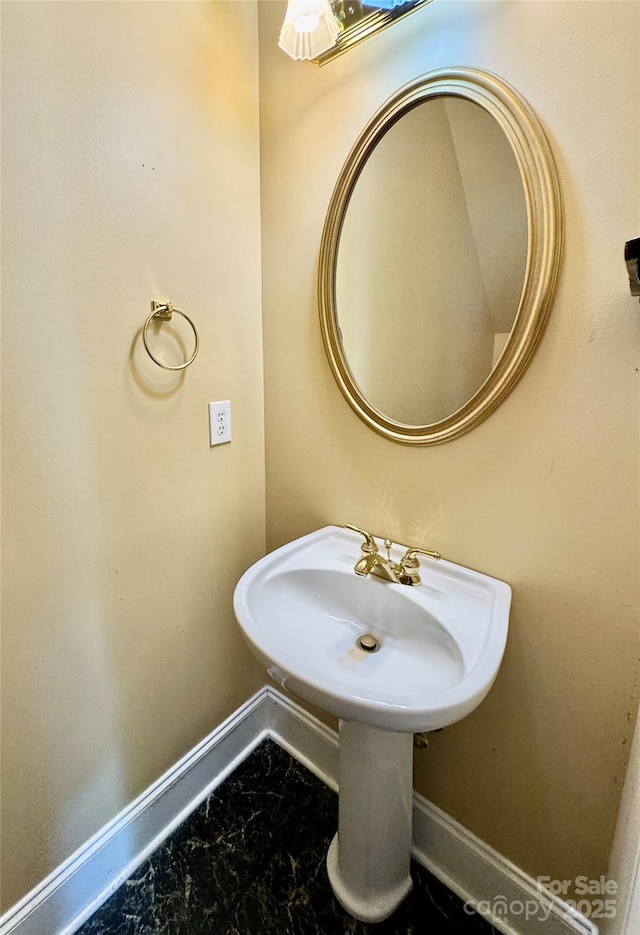 75 Mccurdy St NW, Concord, NC 28027 - bathroom with baseboards and marble finish floors