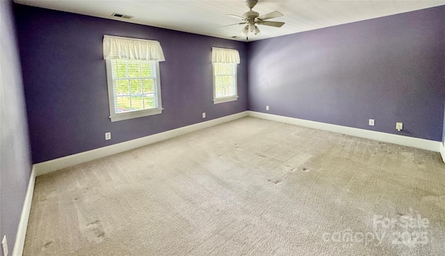 75 Mccurdy St NW, Concord, NC 28027 - carpeted spare room with a ceiling fan and baseboards