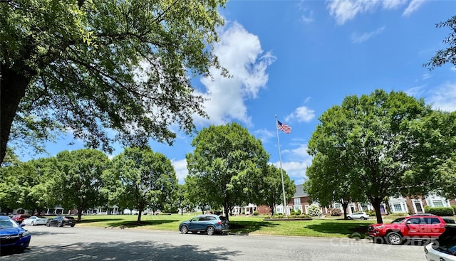 75 Mccurdy St NW, Concord, NC 28027 - view of asphalt road with curbs