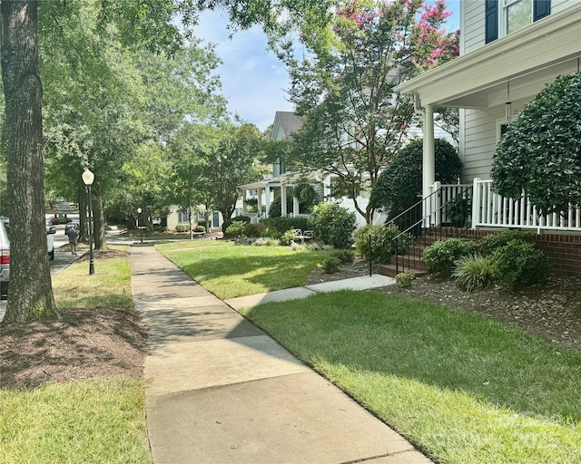 75 Mccurdy St NW, Concord, NC 28027 - view of community featuring a lawn