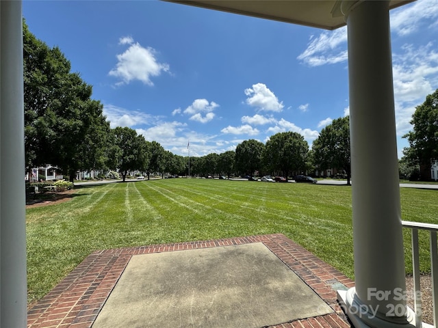 75 Mccurdy St NW, Concord, NC 28027 - view of green lawn with a patio